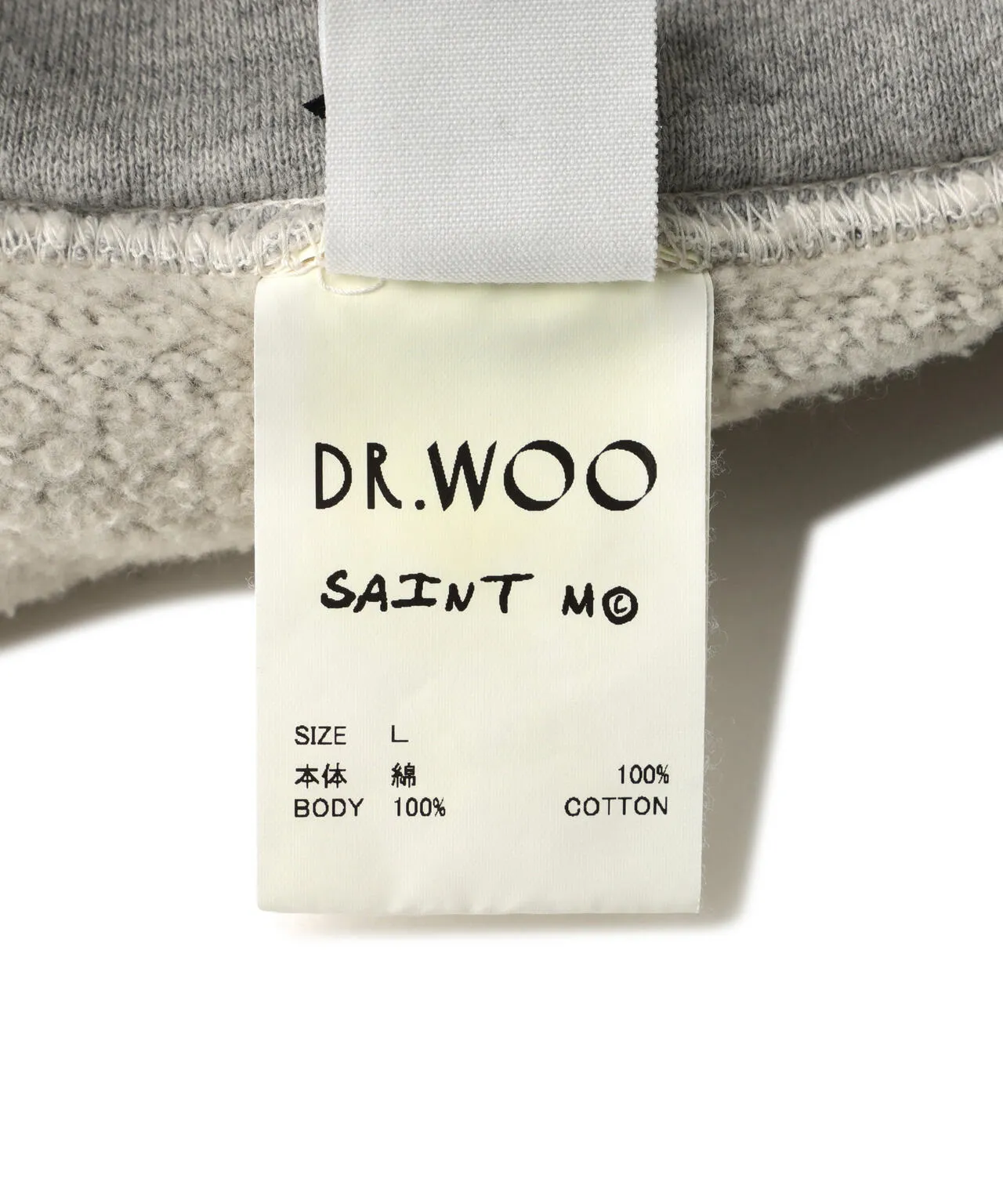 SAINT Mxxxxxx x DR. WOO HOODIE ' Dr.Woo ' /GRY Flame Swirl Spider Web Hoodie Distressed Gray S-XL Custom-woven and dyed nostalgic gray fabric. After printing, the garment is sprayed with potion to cause the fabric to oxidize and fade. A large number of artificial fabric destruction processes are added to make the whole piece of clothing look aged and unique like a work of art. This hoodie is co-branded with a famous tattoo design artist and customized with a full set of Dr.Woo accessories. Bringing you authentic items!